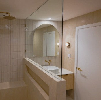 The Eterna Arch mirror cabinet seen from beside the shower screen
